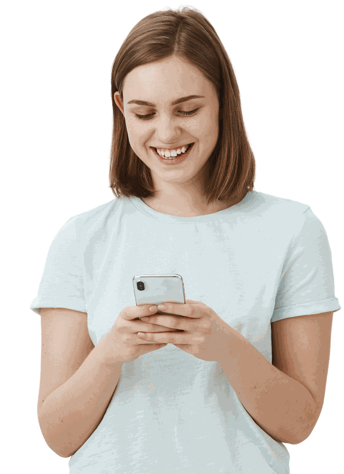 Smiling woman using her phone
